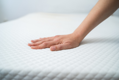 Hand on Mattress