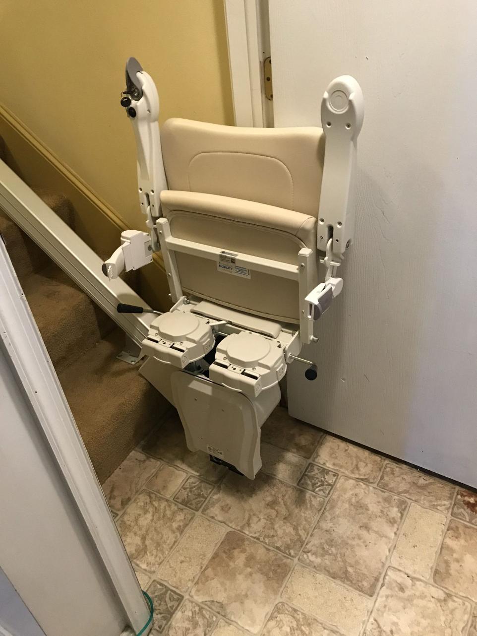folded up straight stairlift