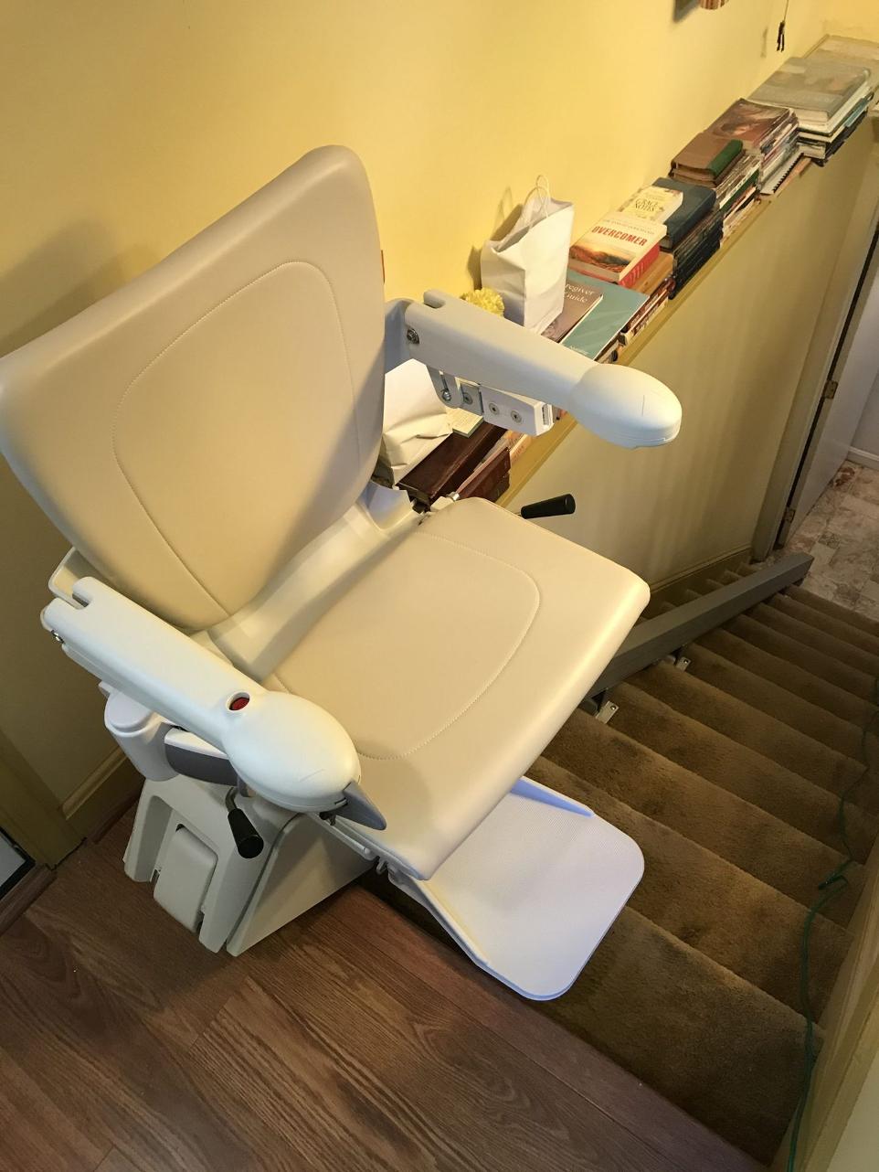 Straight stairlift at the top of the stairs