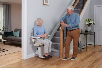 Woman Sitting in a Straight Stairlift