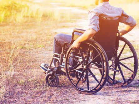 man sitting in wheelchair