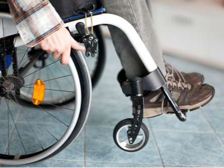 Rolling a wheelchair